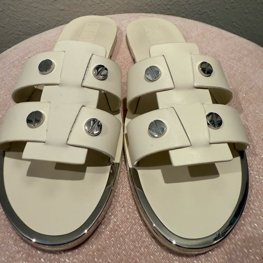DKNY slip on sandals.